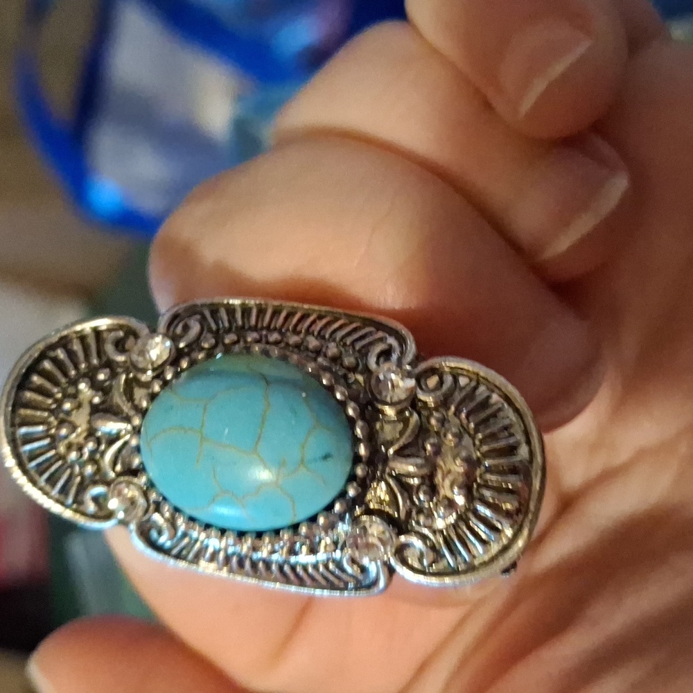 Turquoise adjustable ring starts at size 7 Costume